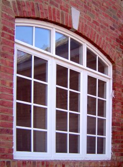 Legacy Triple Casement Window with triple segment top transom.